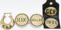 A selection of HORSEBRASSES; oval GCR, oval TMcK & Co LTD, circular MRCo, circular MID & LNN, and