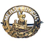 MERSEY DOCKS original brass cap badge complete with clip. Measures 2.75in x 2in. From the Mersey