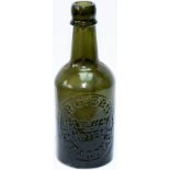 Beer bottle R.GIBBS RAILWAY HOTEL ILFRACOMBE. Green glass with moulded top lip, stands 7.5in tall.