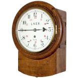 North Eastern Railway 8-inch oak cased iron dial railway clock with a cast brass bezel