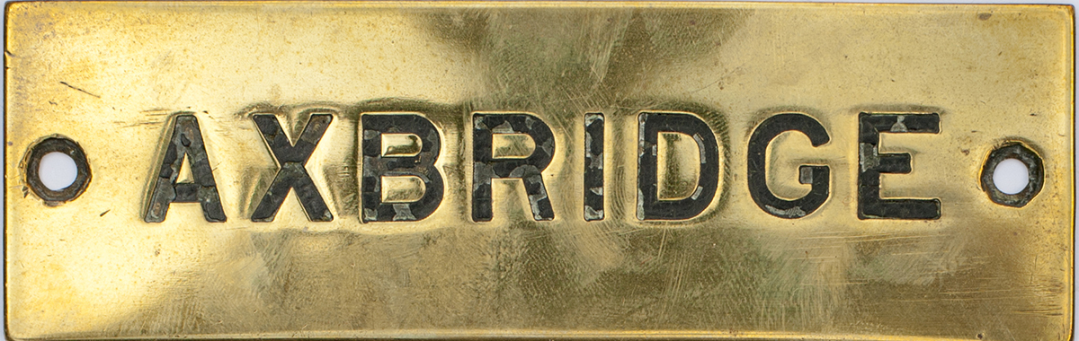 GWR brass Signal Box Shelfplate AXBRIDGE, hand engraved with original wax filling. Measures 4.75in x