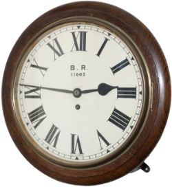 LNER 12in oak cased fusee railway clock ex Barnby Dunn. A medium oak case with a wire driven English