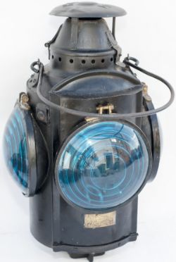 Canadian Railway crossing lamp complete with four blue Bulls-eye lenses, reservoir and burner.