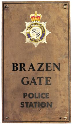 Police station brass sign BRAZEN GATE POLICE STATION with South Yorkshire Police badge at the top.