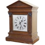 North Eastern Railway 6 inch Gothic Style Oak cased silvered dial railway clock in a bracket style