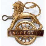 BR(W) gilt lion over wheel cap badge INSPECTOR. In very good condition complete with original back