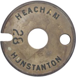 Tyers No 6 brass and steel single line tablet HEACHAM 28 HUNSTANTON. From the former Great Eastern