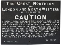 Great Northern and London and North Western Joint Committee cast iron TRESPASS sign. It has had some