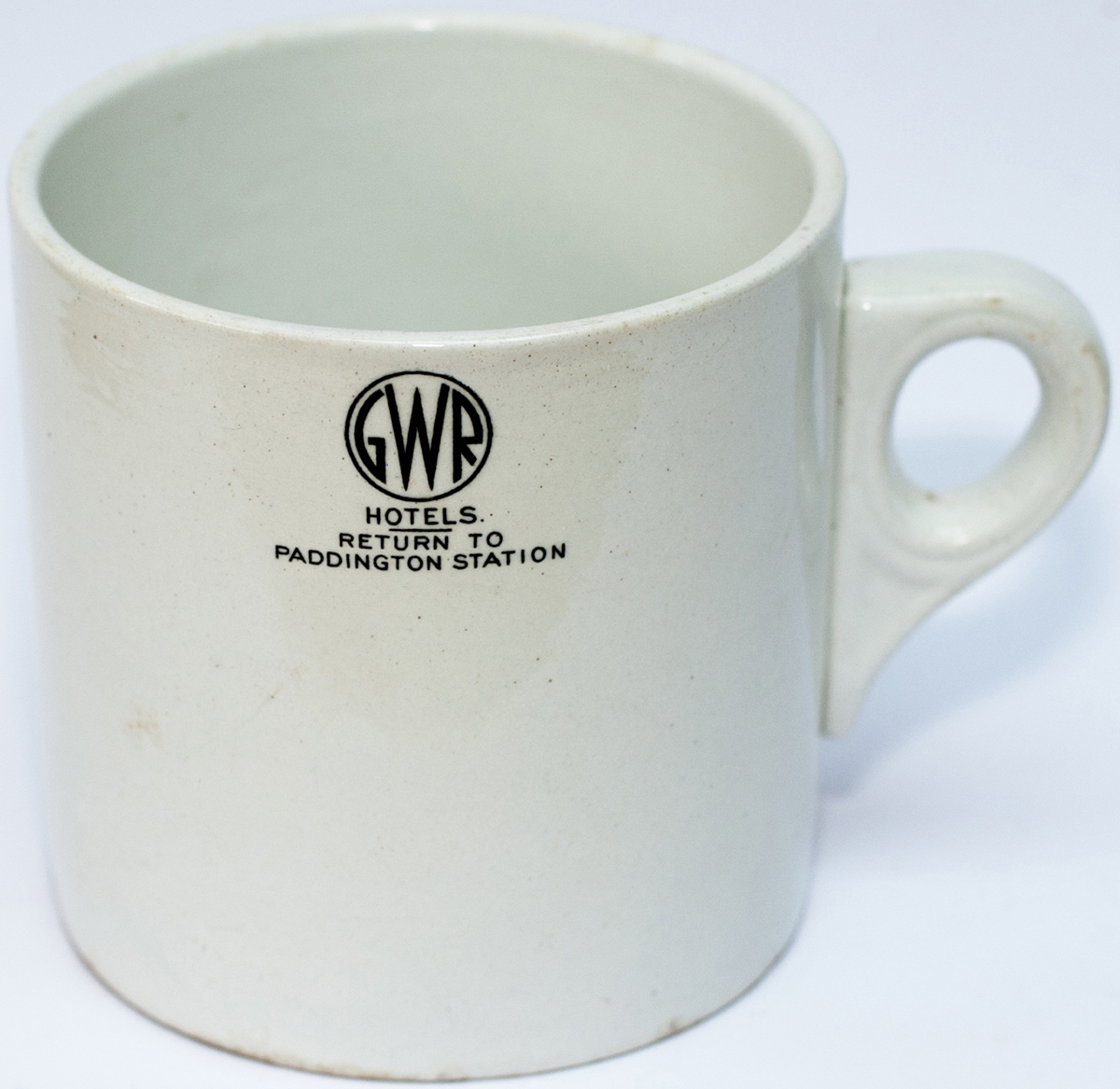 GWR porcelain 1 pint china mug, GWR roundel and HOTELS RETURN TO PADDINGTON STATION on the side