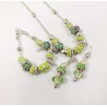 A Pandora necklace, with green glass and enamelled beads,