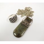 A labradorite pendant, with faceted paste embellishment, suspended form white metal chain,