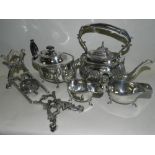 A pair of silver sauceboats hallmarked 'Birmingham' together with a silver plated teapot and a