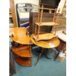 A mahogany three tier what not, the shelf spaced by baluster columns,