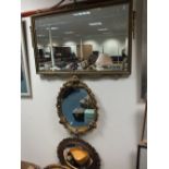 Four various gilt framed wall mirrors in period style.