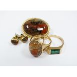 A suite of 9ct gold moss agate set jewellery, comprising; a ring, brooch and a pair of earrings,