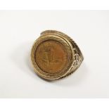 A 1/10 Krugerrand coin ring, set to openwork 9ct gold shank, weight 7.