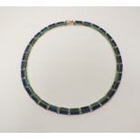 A lapis lazuli and malachite plaque necklace/collarette, set in white metal,