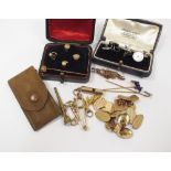 Two pairs of 9ct gold cufflinks, together with a single 9ct gold cufflink,
