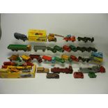 Thirty unboxed Dinky commercial and army vehicles dating from the 1950s and suitable for