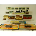 An N Gauge Railway Layout comprising a GWR Prairie 0-6-0 locomotive with ten boxed wagons and three