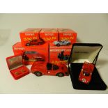 A group of ten boxed models to include six Ferrari 330 P4 cars in yellow, a GTO in red,
