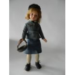 A Pedigree doll dressed in the uniform of the Womens' Royal Air Force,