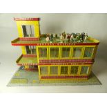 A tinplate Mettoy 'Emergency Ward 10' hospital circa 1960, the model with operating lifts,