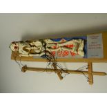A Pelham Puppets Skeleton in original brown cardboard box with original packing and tissue.