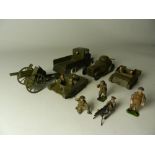 A group of restored Britains army vehicles and figures to include a four wheel army wagon with