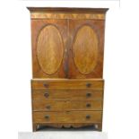 A late George III mahogany linen press,