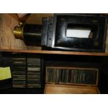 A slide projector together with a collection of assorted slides including views of cathedrals