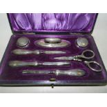 A cased silver mounted manicure set