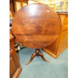 A 19th century mahogany tilt top tripod occasional table