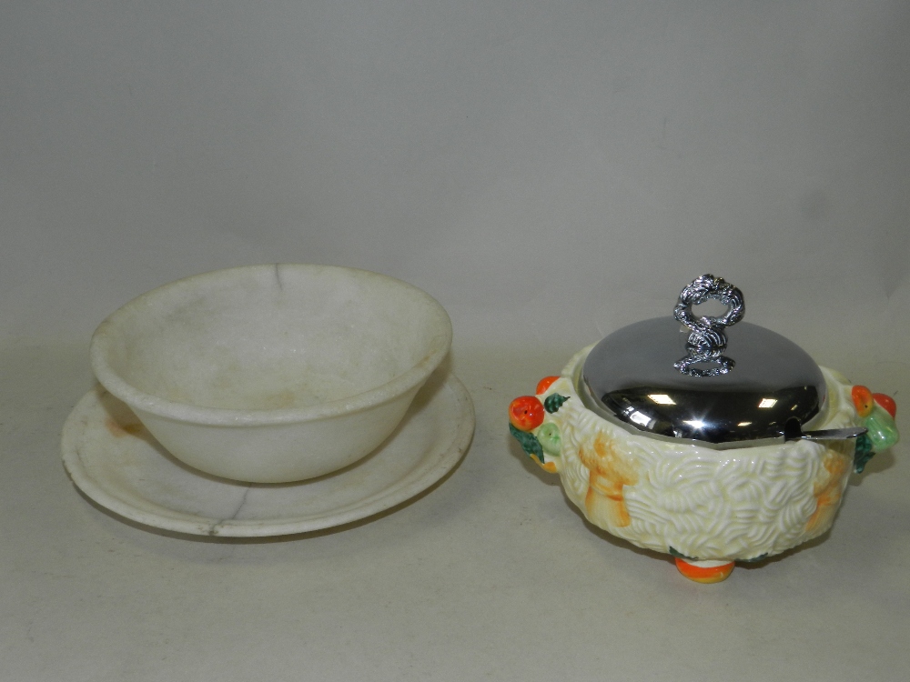 A Clarice Cliff Newport pottery 'Celtic Harvest' pattern preserve jar and cover together with an