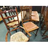 A set of four Edwardian oak dining chairs together with a reproduction mahogany ladder back bedroom
