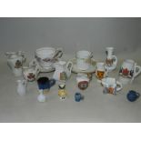 A large collection of crested miniatures to include Goss examples and Meissen cup and saucer