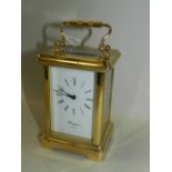 A brass cased carriage timepiece, the dial signed 'Rapport,