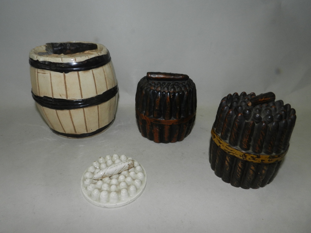 Three Victorian pottery cigar boxes and covers, including a Bretby example, each of barrel shape, - Image 2 of 2