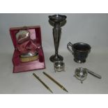 A cased three piece silver mounted travelling dressing table set, pair of salts,