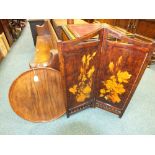 An Edwardian stained mahogany two fold fire screen, the panels decorated with roses,