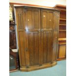 An early 20th century oak wardrobe,