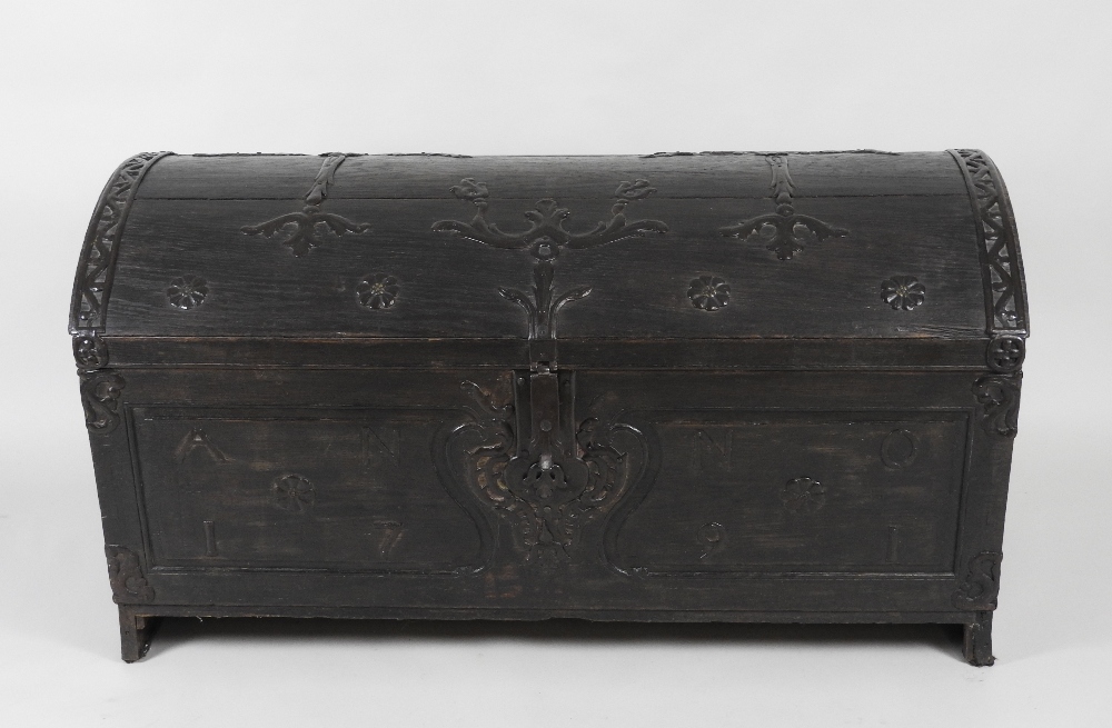 A late 18th century German stained oak domed lid trunk,