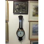 An early 20th century oak barometer and a photograph of Princess Elizabeth's visit to Harlech