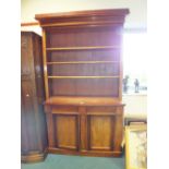 A Victorian mahogany bookcase cabinet