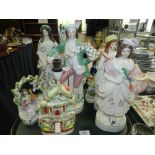 A quantity of 19th century and later Staffordshire wares to include a castle converted into a table