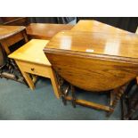 A small Edwardian oak gate-leg occasional table and a modern beech effect occasional table