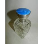 A silver and blue guilloche enamel topped dressing table jar