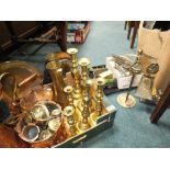 A mixed collection of works of art and toys to include: brass candlesticks, vases,