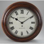 A 19th century single fusee circular wall timepiece, the 11 inch enamel dial signed W Greenwood,