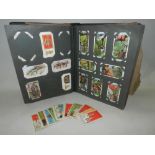 A collection of cigarette cards, to include a full set of Salmon and Gluckstein Magical Series,